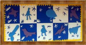 Les élèves de maternelles : étude d'un tableau - Animaux reproduits sur des  carrés de bois